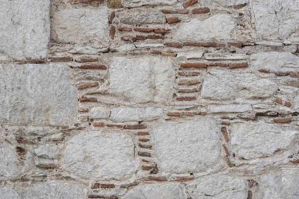 I åldern sten, textur gamla tegel närbild — Stockfoto