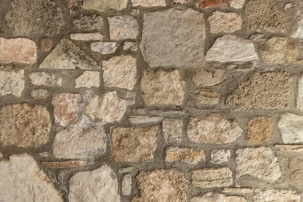 Textura de granito, primer plano de la superficie de la pared de piedra — Foto de Stock