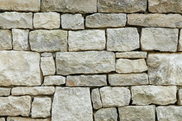 Aged stone, old bricks texture closeup