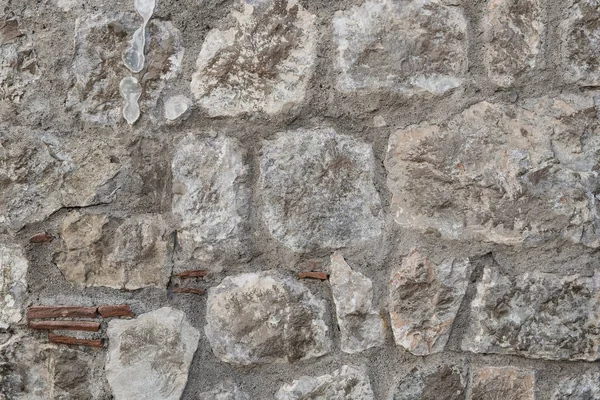 Textura de granito, primer plano de la superficie de la pared de piedra — Foto de Stock