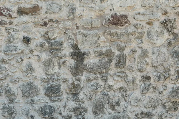 Textura de granito, primer plano de la superficie de la pared de piedra — Foto de Stock