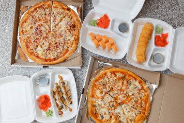 Pizza and sushi. Delivery in containers and boxes clipart