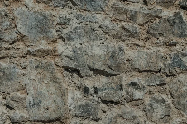 Žula texturu, kamenná zeď povrchu closeup — Stock fotografie