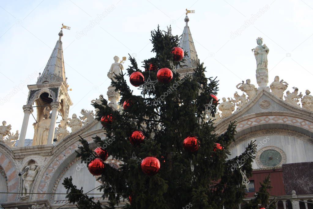 Christmas pine tree with big red balls in Venice, Italy.