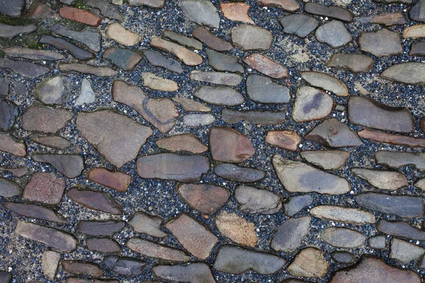 Texture of stone pavement tiles cobblestones bricks background — Stock Photo, Image