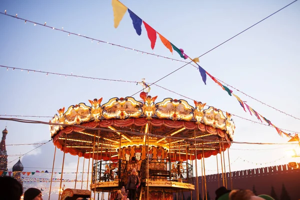 Christmas carousel on Red square. New year celebration and fairy — Stock Photo, Image