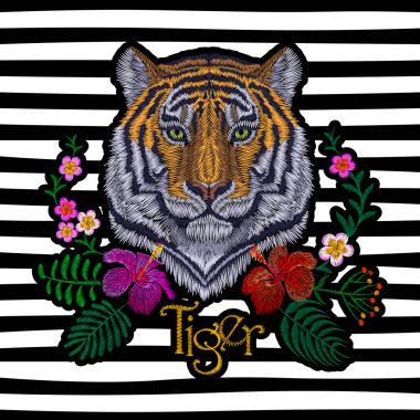 Kaplan baş tropic çiçek. Önden Görünüm nakış yama etiket. Turuncu çizgili siyah vahşi hayvan dikiş doku Tekstil baskı. Orman logo vektör çizim