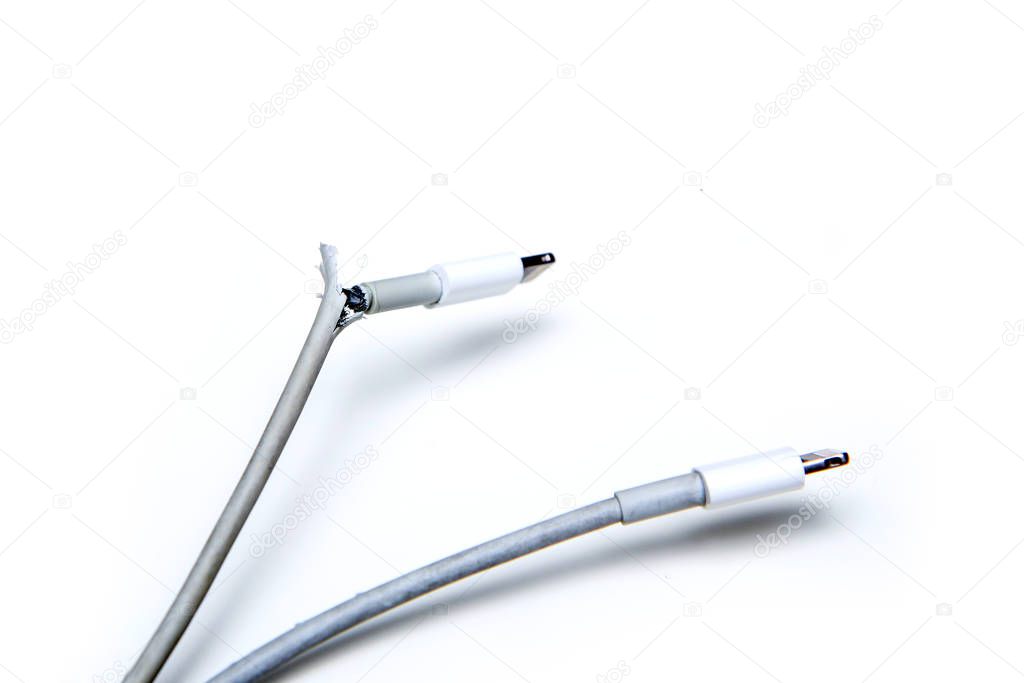 The broken and frayed cable from the charger for the smart phones. Typical problem of the users. Compared with the good one.