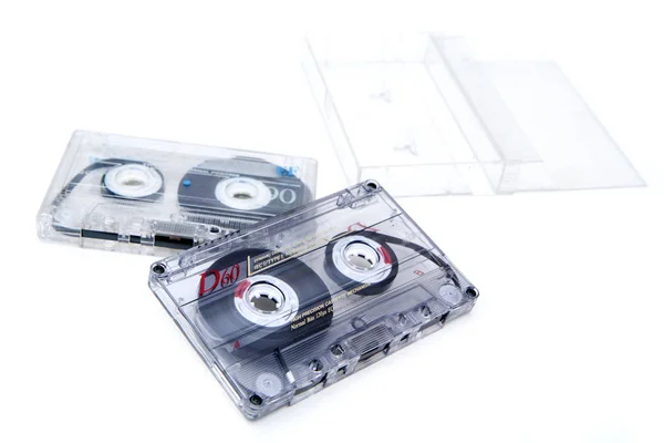 Dois Antigos Cassetes Áudio Magnético Com Uma Capa Plástico Usada — Fotografia de Stock