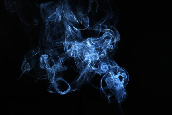 The abstract picture of the smoke. made by usage of the flash against black background.