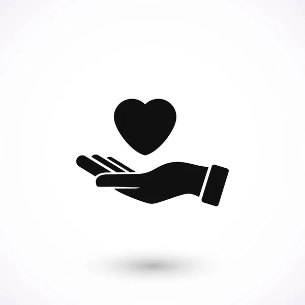 Kéz, a szív ikon — Stock Vector