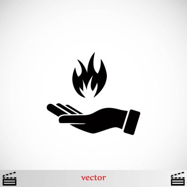 bir yangın simgesi tutan el