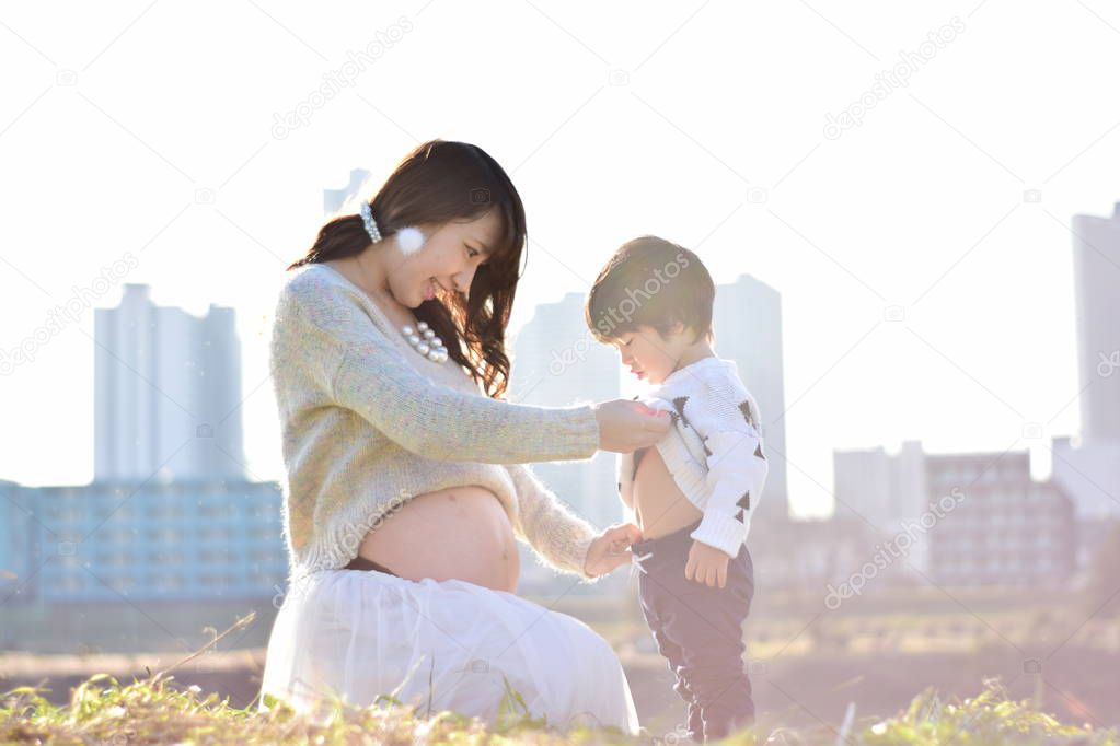 mom having baby with her son