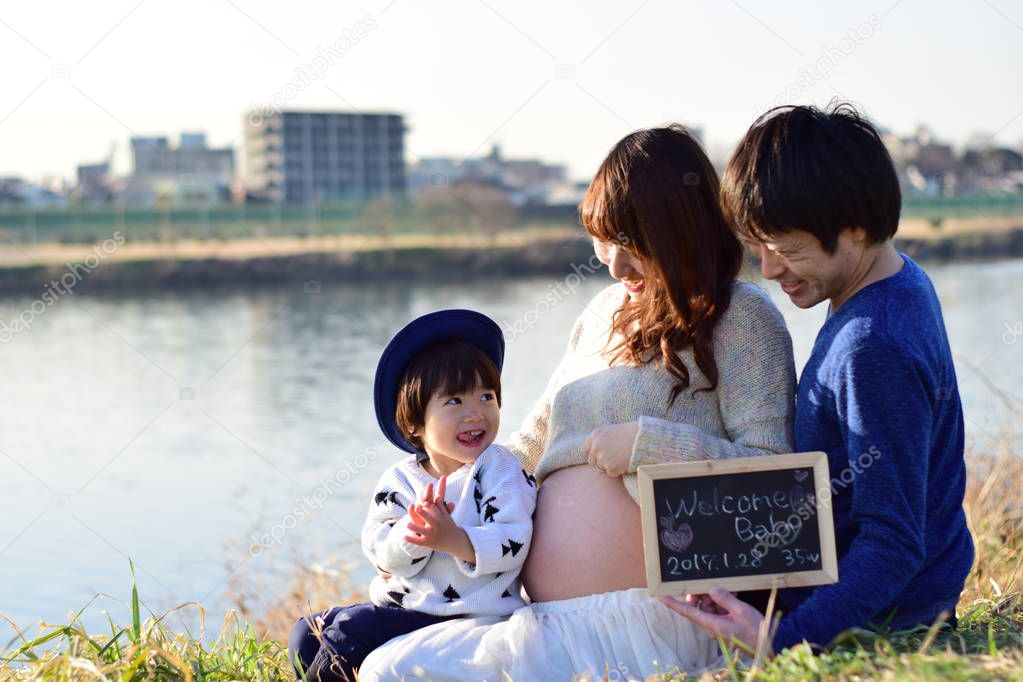 young family taking photo