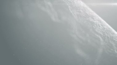 Parçacıklar beyaz iş temiz parlak parıltı toz soyut zemin döngüsü