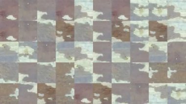 Kahverengi aşınmış ahşap bir tahtanın parçalarından mozaik dokuların soyut videosu. Arkaplan tasarımı. Arkaplan. Duvar Kağıdı.