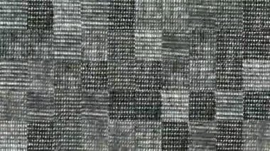 Gri kot parçalarından mozaik dokuların soyut videosu. Arkaplan tasarımı. Arkaplan. Duvar Kağıdı.