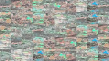 Kırmızı yeşil boyanın soyulduğu kahverengi eski bir tahtanın elementlerinden mozaik dokuların soyut videosu. Arkaplan tasarımı. Arkaplan. Duvar Kağıdı.