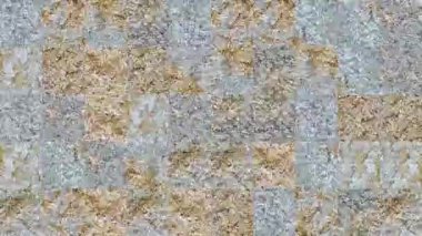Turuncu gri beton duvardaki elementlerin mozaik dokularının soyut videosu. Arkaplan tasarımı. Arkaplan. Duvar Kağıdı.