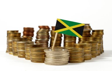 Jamaika bayrak sallayarak para sikke yığını ile