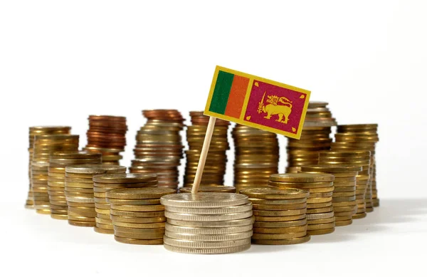 Sri Lanka flag waving with stack of money coins — Stock Photo, Image