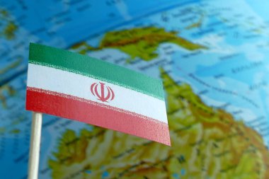 Bir arka plan makro olarak bir harita ile Iran bayrağı