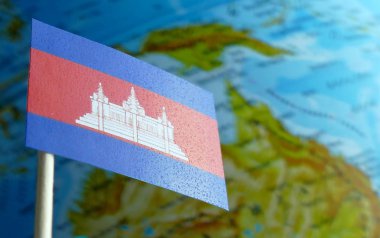 Kamboçya bayrağı bir arka plan makro olarak bir harita ile