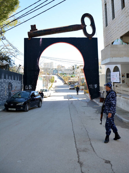 Bethlehem, Palestine. January 6th 2017 - Aida Refugee Camp In Palestine, Officer at the entrance of the camp 