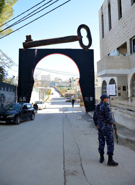 Bethlehem, Palestine. January 6th 2017 - Aida Refugee Camp In Palestine, Officer at the entrance of the camp 