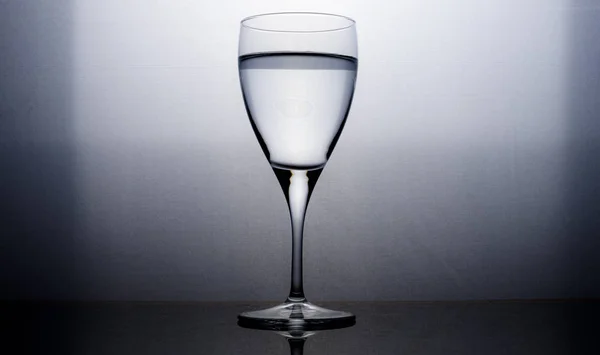 Glass of water silhouette — Stock Photo, Image