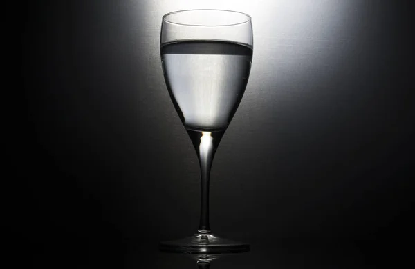 Glas water silhouet — Stockfoto