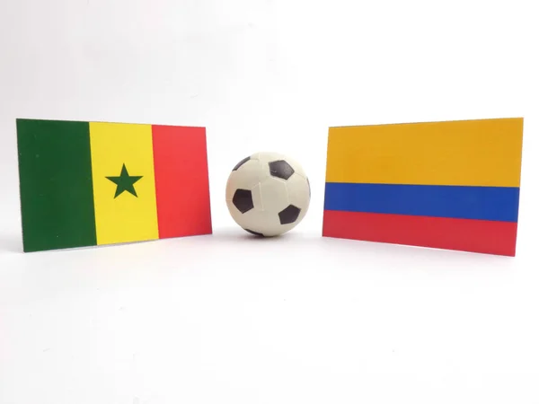 Senegalese and Colombian flag with football ball isloated on white background