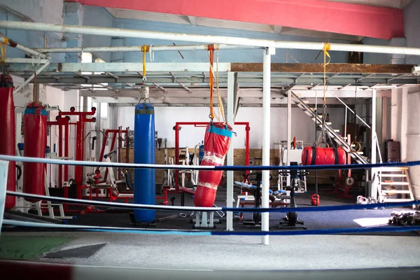 Old colorful boxing gym space.