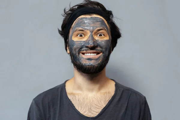 Portrait Young Smiling Disheveled Guy Facial Mask Background Grey Background — 스톡 사진