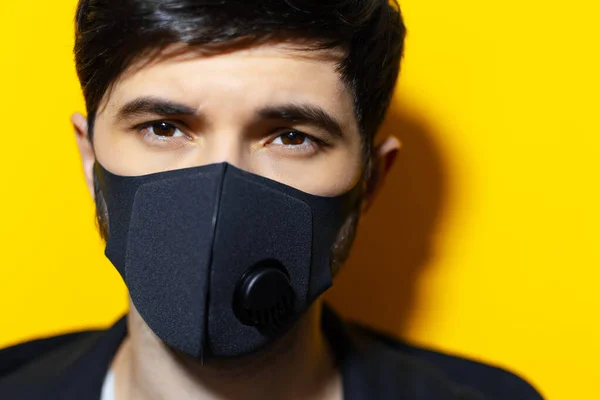 Close Portrait Young Guy Wearing Respiratory Face Mask Black Color — Stock Photo, Image