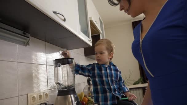 Busy Young Mother Preparing Fast Breakfast Son Child Sitting Kitchen — Stock Video