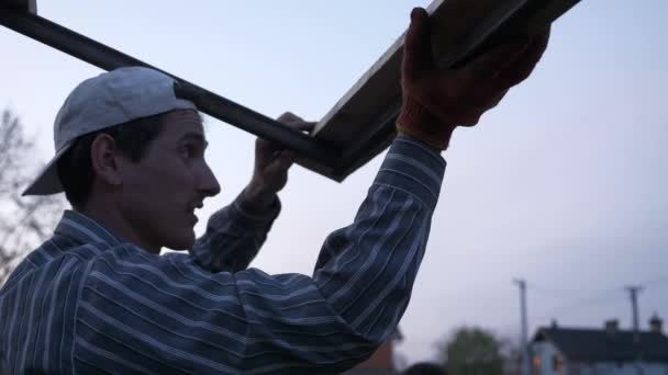 Young Man Marks Pencil Wood Metal Construction Backyard Garden Σπιτικό — Αρχείο Βίντεο
