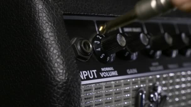 Musician Hand Plugs Cable Speaker Amplifier Turning Knobs Rocker Records — стокове відео
