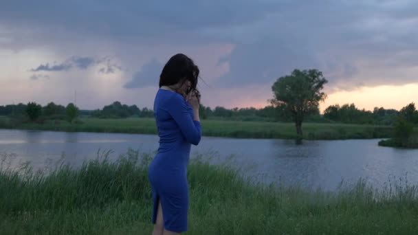 Lightning Flashes While Girl Praying Rural Road River Field Scenic — Stock Video