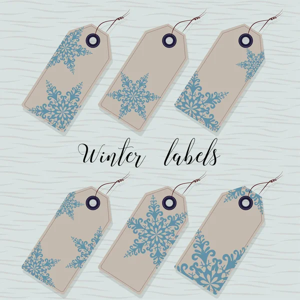 Winter labels. Six paper labels for gifts. Decorated twisted snowflakes. — Stock Vector