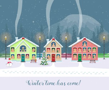 Kış zamanı geldi. Kartpostal karda güzel evleriyle. Süslü Noel öğeleri.
