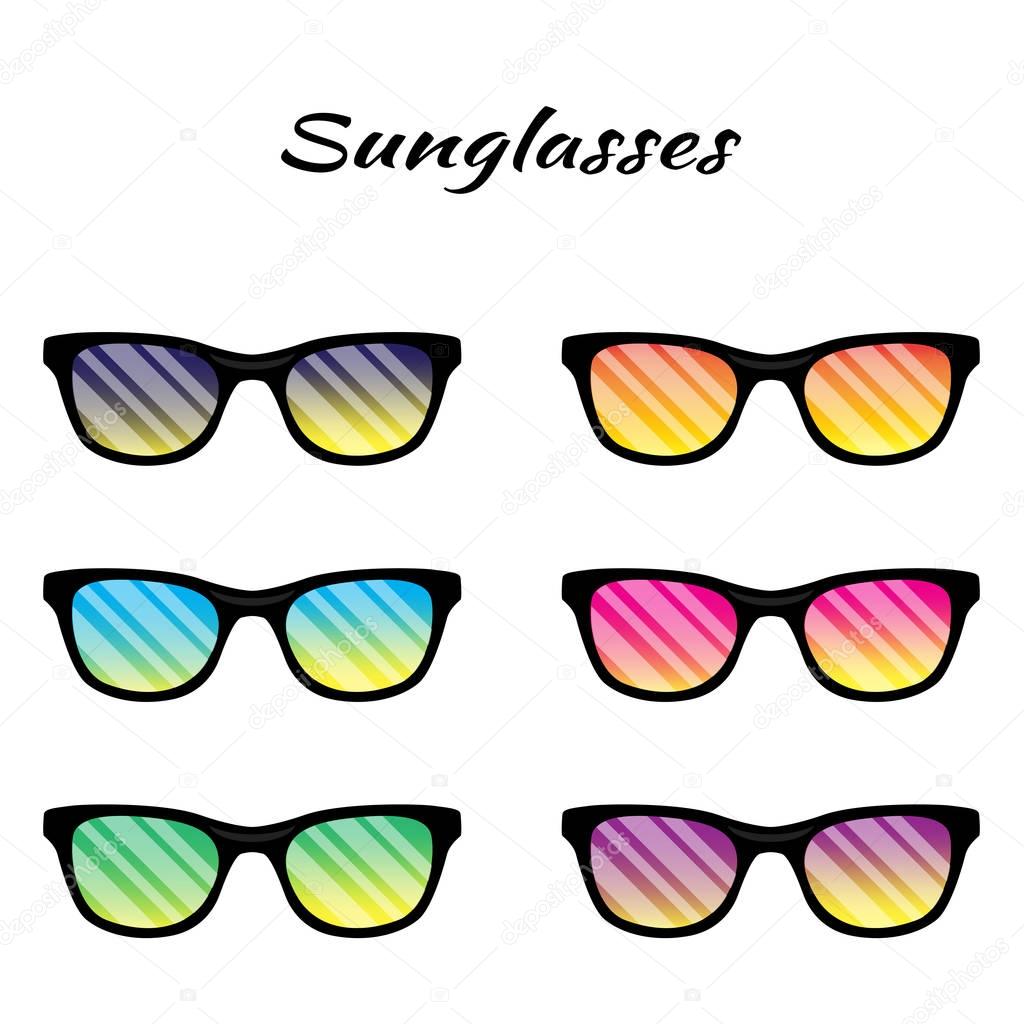 Sunglasses with colored glasses on a white background