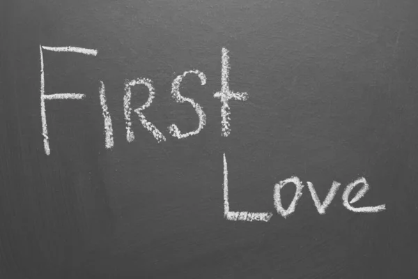 Handwritten Inscription Chalk First Love Gray Board — Stock Photo, Image