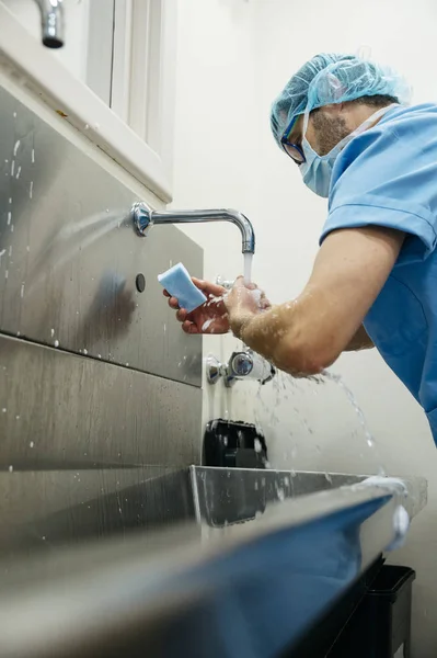 Side View Man Blue Medical Uniform Using Sponge While Washing — Stock Photo, Image