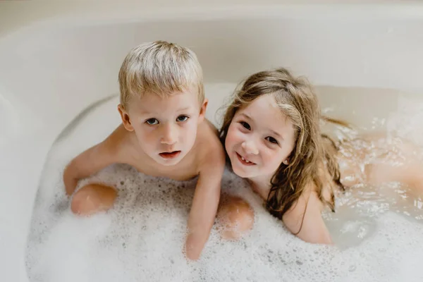Funny Children Playing Foam Bath — Stock Photo, Image