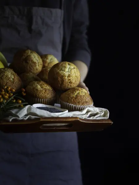 Crop Person Dray Apron Brown Tray Full Freshly Baked Muffins — Stock Photo, Image