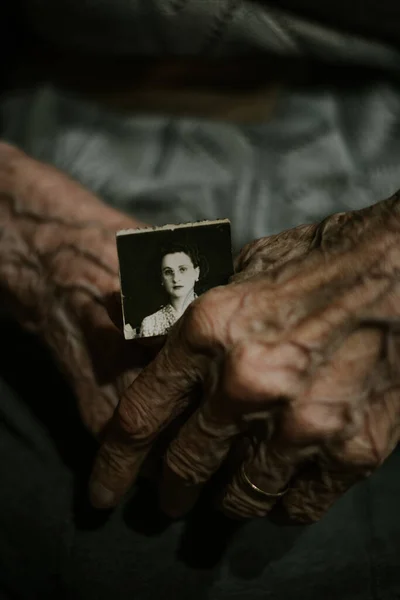 Anonymous Elderly Person Holding Aged Photo Home — Stock Photo, Image