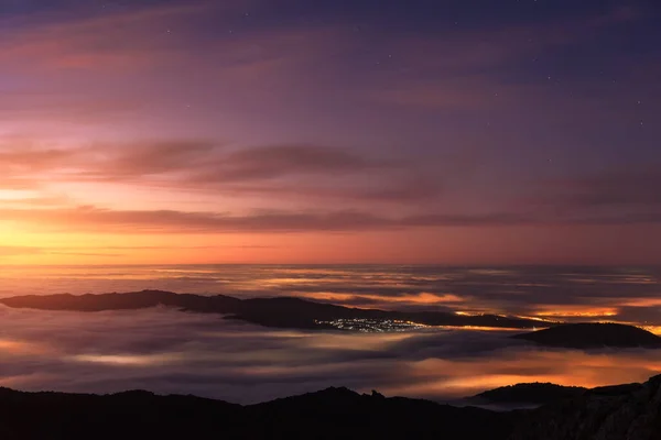 Aerial View Modern City Mountains Covered Tick Clouds Colorful Sky — Stock Photo, Image