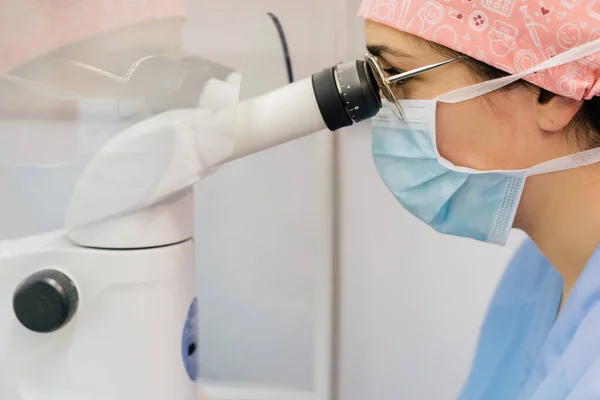 Side View Woman Medical Uniform Mask Using Modern Microscope Examine — Stock Photo, Image
