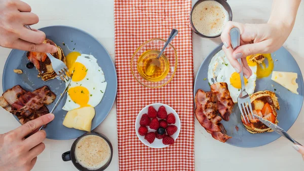 View Crop Anonymous Couple Eating Tasty Fried Eggs Cheese Bacon — Stock Photo, Image